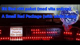 Ett litet rött paket (med vita snören)  A Small Red Package (with white laces)