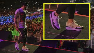 Eminem might have injured his foot during Rapture. He is wearing a bandage or different socks screenshot 1
