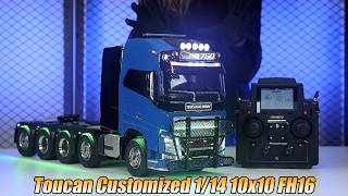 Custom Unitru‑02 10×10 Custom paint,10×10 full‑metal axles, linked driver figure & electric wipers.