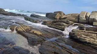 Harmony of Elements, The Serenity of Beach Water, Waves, Silence, and Rocks