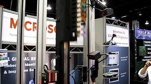 Microscan 1D and 2D Barcode Scanners/Readers Reading Code on Moving Specimen Tubes