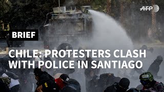 Clashes as thousands protest in Chile | AFP