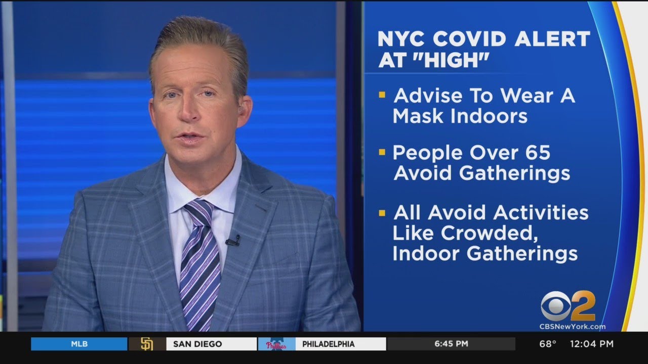 NYC raises COVID alert level to "high" - YouTube