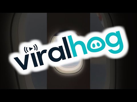 Tornado Captured from Airplane Window || ViralHog