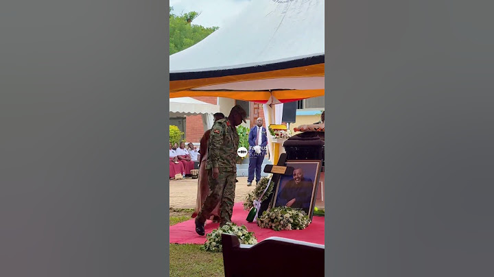 CDF General Muhoozi Kainerugaba, along with his wife, Charlotte, lays a wreath at Cedric's casket