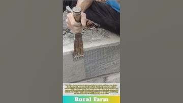 Masterful craftsman stone sculpting: hardworking rural worker carving stone wall with simple tool