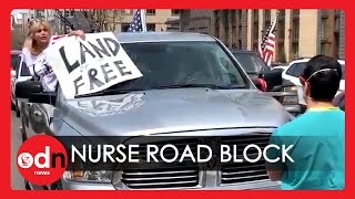 Two Nurses Block Line of Furious Lockdown Protesters in Colorado