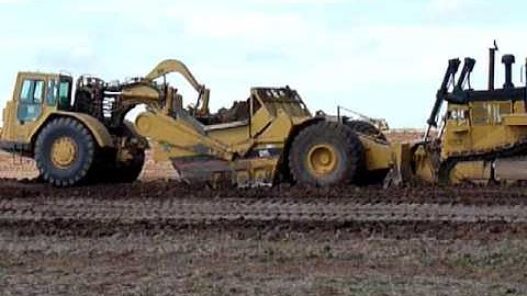 CAT 631 LOADING VIDEO #1 - DALHART, TX