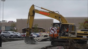Caterpillar 320BL Excavator Getting Loaded On A Lowboy