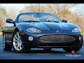 This Carbon Fiber edition XK8 looks like a Victory Edition XKR with Analog Gauges