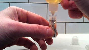 How To Fill Up A Ego-W Clearomiser / Clearomizer the easy way  - Available from Juicycigs.com
