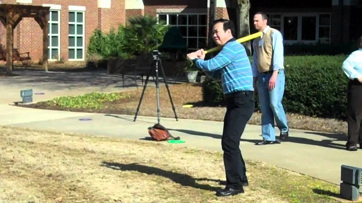 Professor Wei Zhiqiang pitches and hits WIFFLE ball