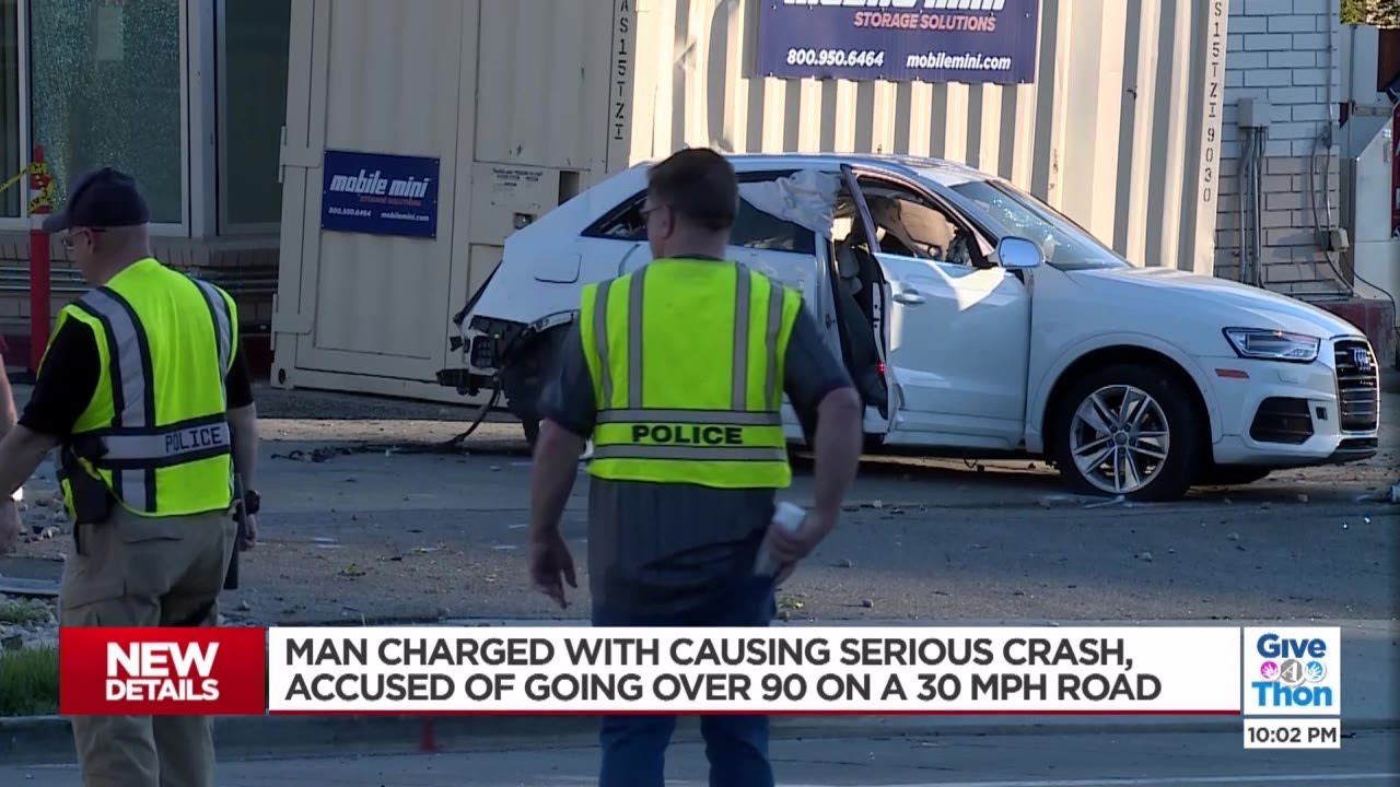 Man facing six charges after car accident that injured two - YouTube