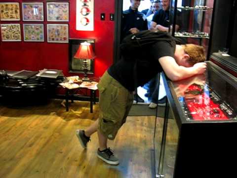Kicked in the nuts at Planet New York Tattoo