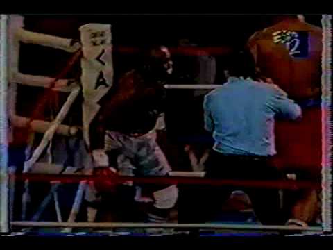 FOREMAN KNOCKING DOWN QAWI DOWN WHERE ROPES SAVE F...