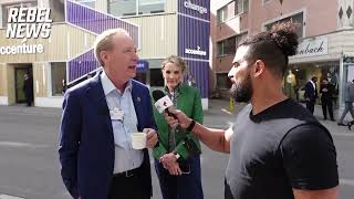 Avi Yemini CHALLENGES Microsoft President in Davos