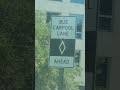 Bus carpool lane ahead sign