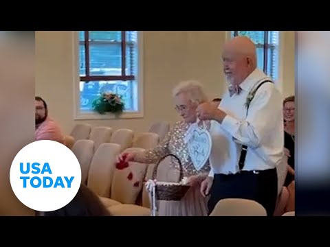 Grandparents serve as ring bearer and flower girl at a wedding | USA TODAY