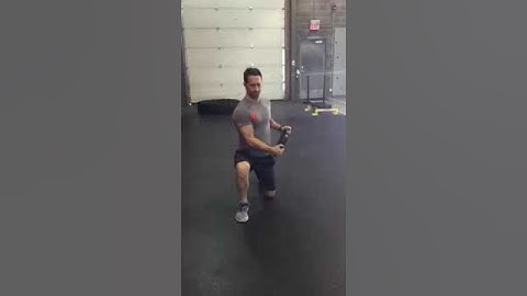 1/2 kneel cross body chop w weight plate