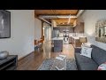 Tour a 2-bedroom, 2-bath model at The Lofts at River East