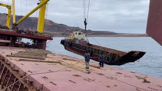 ООО Рейд погрузка баржи на судно