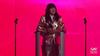 Andreea Gleeson accepts her 2026 She Rocks Award