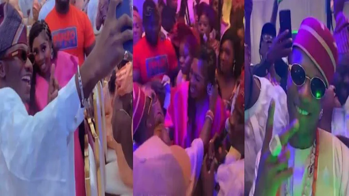 Tiwa savage sprays bestie Wizkid money at his mum burial ceremony