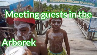 Meeting guests in the kampung Arborek @Ad0a0m