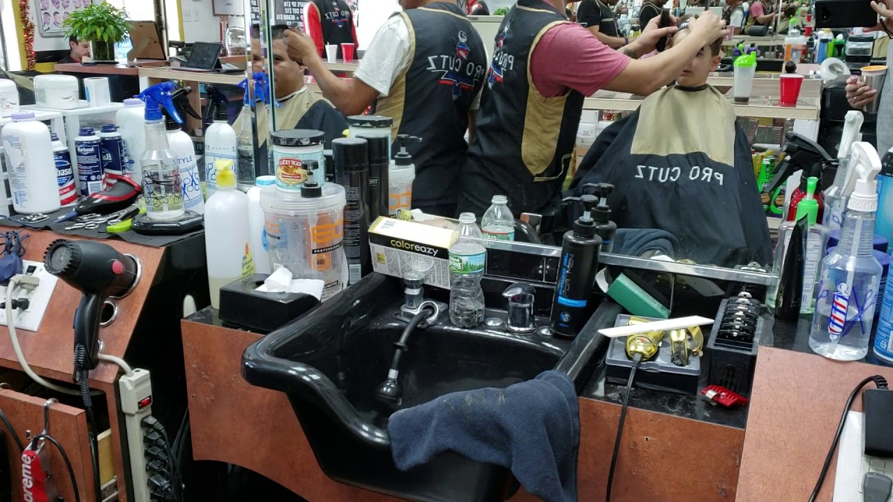 Leo's 1st Dominican Barber Shop Haircut... YouTube