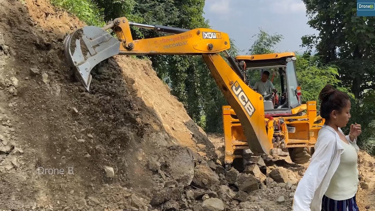 Cutting Hillside Slope to Avoid Possible Landslide-JCB Backhoe