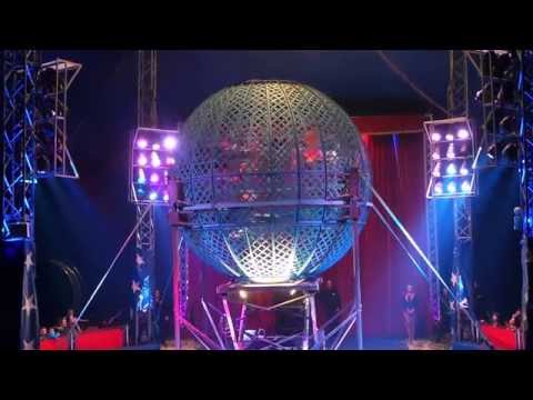 How would you explain the motion of a motorcyclist in a globe of death in a circus?
