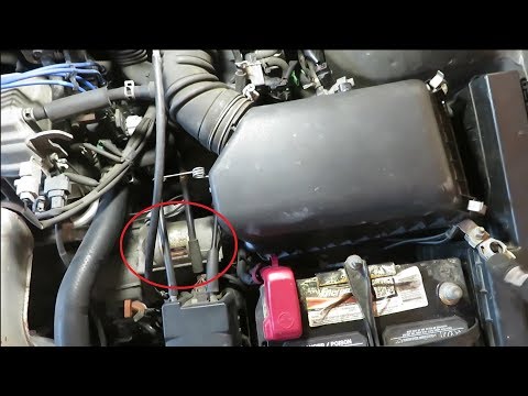 Vidéo: Où se trouve le démarreur sur une Toyota Camry 97 ?