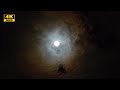 Moon in Night Sky. Moon in the clouds. 4K video 2 min 40s