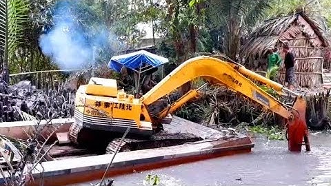 XE CUỐC MÚC ĐẤT TRÊN SÔNG KINH RẠCH cần cẩu xáng dây xe xúc