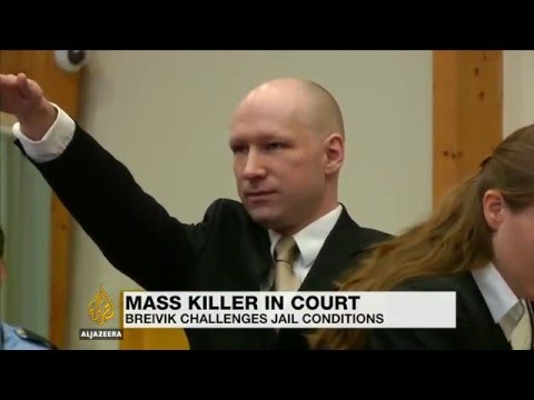 Anders Breivik returns to court with a Nazi salute