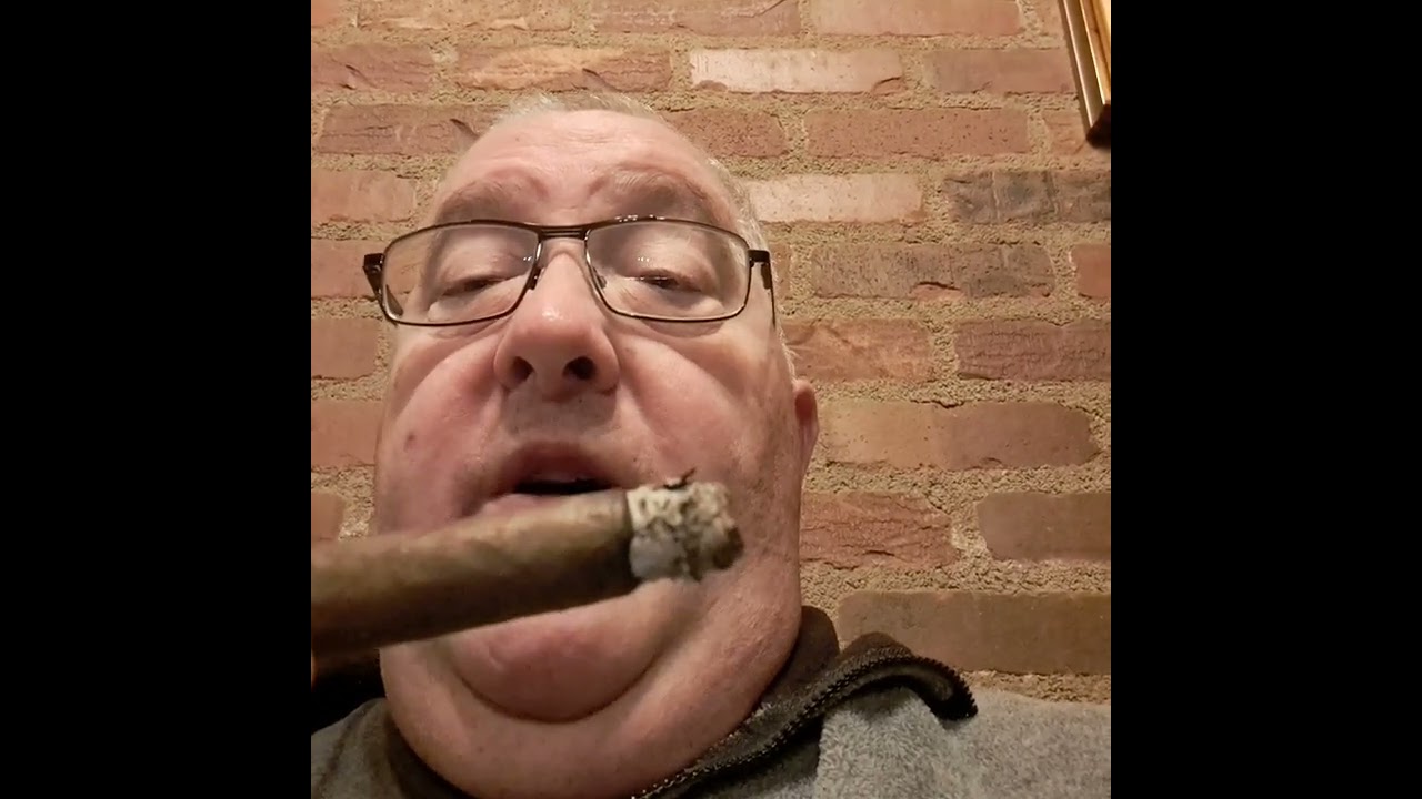 AT EDWARDS TOBACCO SHOP IN ENGLEWOOD COLORADO SMOKING A CUBAN ROUNDS MADURO CIGAR!