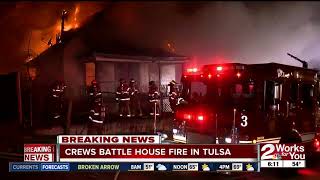 Crews battle house fire in north Tulsa