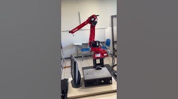 Kinematic Control showing JOINT and LINEAR commands on a Comau Smart Six robot using PDL2 language.