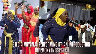 Stecia Mayanja performing at an introduction ceremony in Sseguku