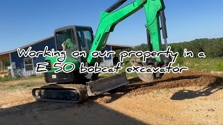 Working on the property in a excavator. #hedgehogshomestead #E50bobcat