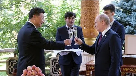 Happy birthday! Putin celebrates Xi's 66th birthday with cake