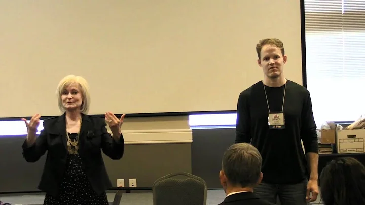 Sandra Zimmer Guides a Volunteer Speaker to Transf...