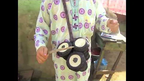 White boy plays bata drums in Nigeria