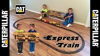 Opening, setting up, and playing with a Caterpillar Construction Express Train. This Train is 23 feet long! Please subscribe and 