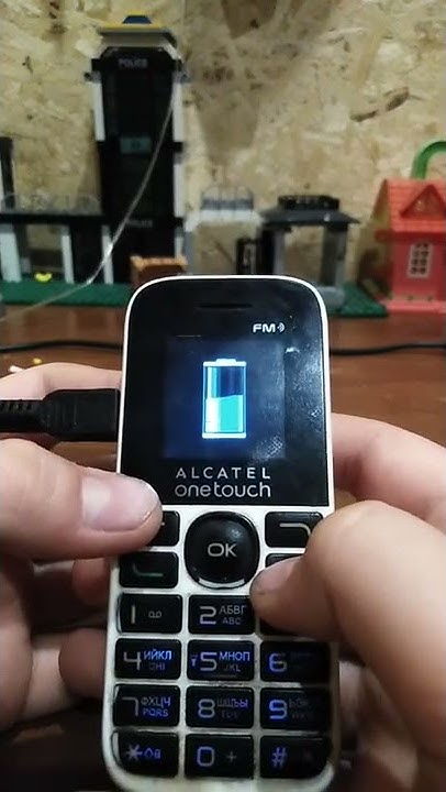 Alcatel One Touch 1013D Зарядка - YouTube