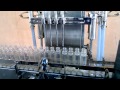 GMP Semi Automatic Four Head Volumetric Liquid Filling Machine