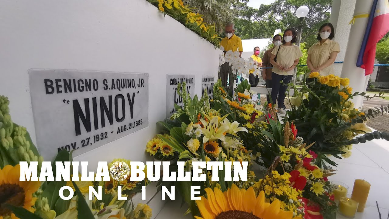 Ballsy AquinoCruz and Viel AquinoDee visit the tomb of their father