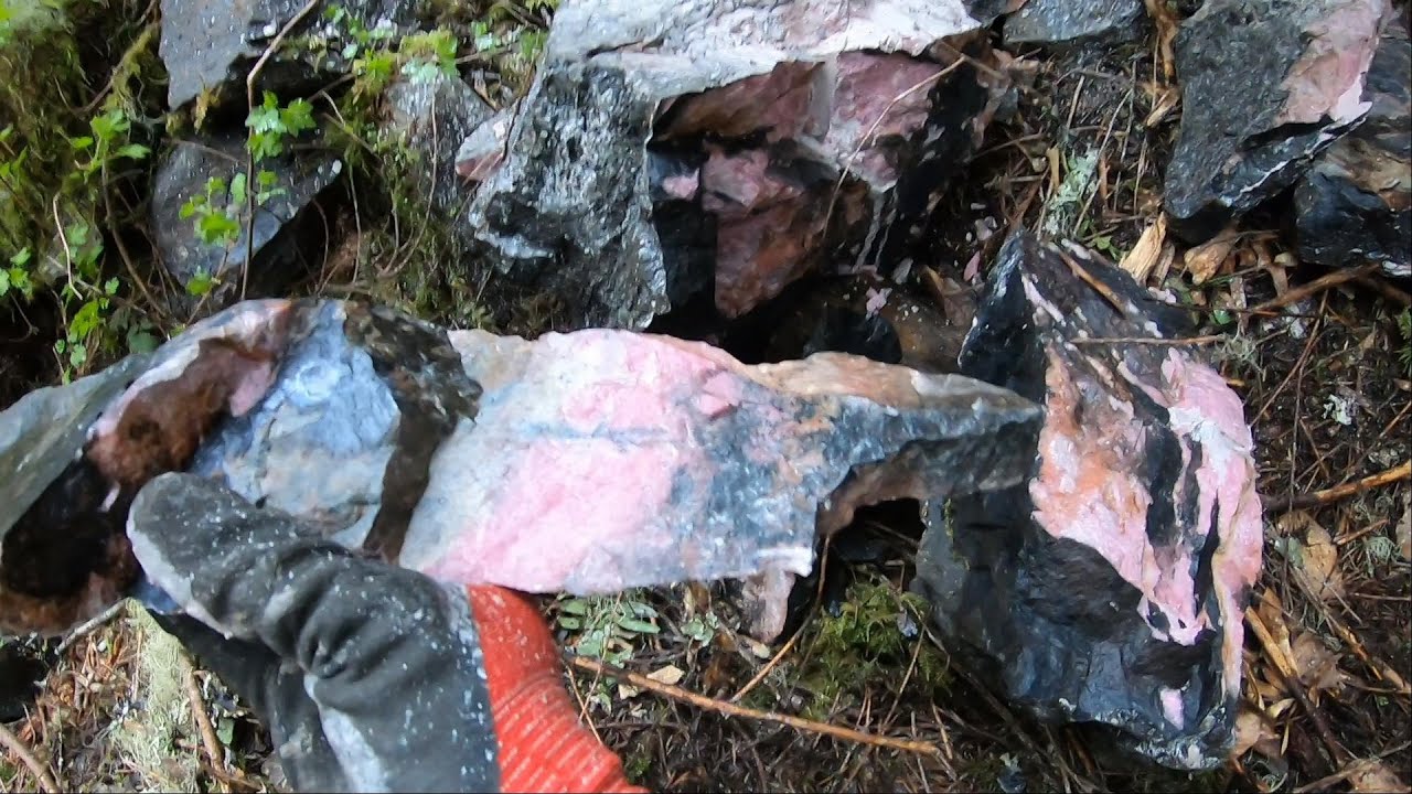 150+lbs Rhodonite boulder split with feather and wedges - YouTube
