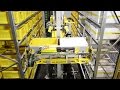 Storageretrieval machine for bins cartons and trays  schfer miniload crane