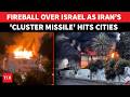 Israel BURNS After Massive Iran Missile, Cluster Munitions Barrage; Fires and Craters In Tel Aviv